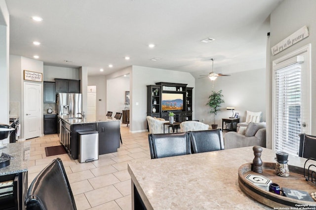 2730 Tortuga Verde, San Antonio, TX 78245 - dining room with a ceiling fan, recessed lighting, wine cooler, and light tile patterned floors