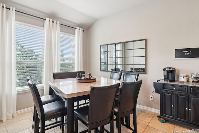 2730 Tortuga Verde, San Antonio, TX 78245 - dining room with vaulted ceiling, baseboards, and light tile patterned floors