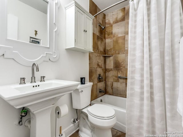 3318 Stone Cave, San Antonio, TX 78247 - full bathroom featuring shower / tub combo with curtain, toilet, and a sink