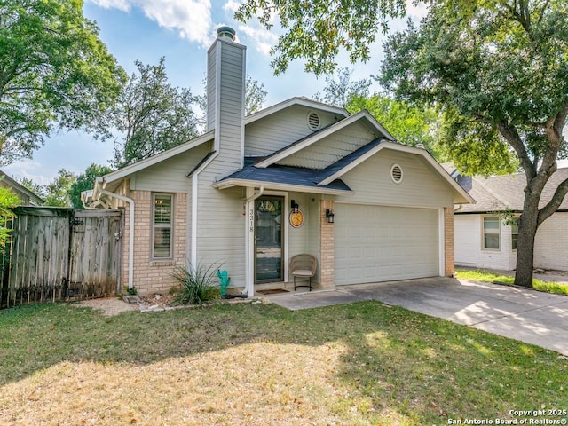 3318 Stone Cave, San Antonio, TX 78247 - view of front of house featuring an attached garage, concrete driveway, a chimney, and brick siding