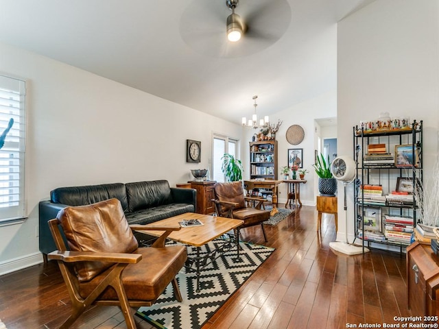 3318 Stone Cave, San Antonio, TX 78247 - living room featuring a chandelier, a ceiling fan, hardwood / wood-style floors, and baseboards