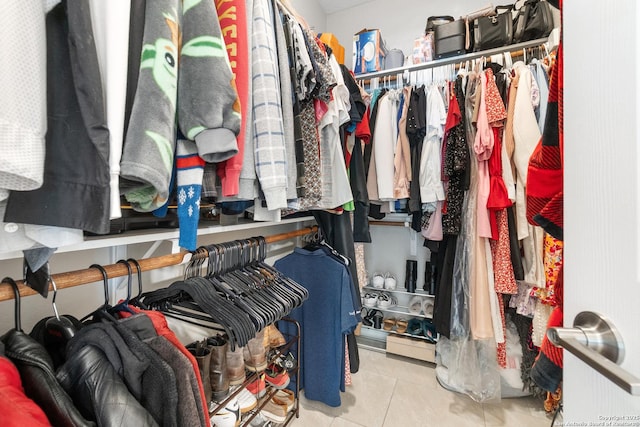 422 42nd, San Antonio, TX 78237 - spacious closet featuring tile patterned floors