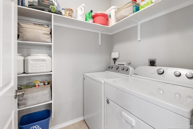 422 42nd, San Antonio, TX 78237 - laundry area featuring separate washer and dryer and baseboards