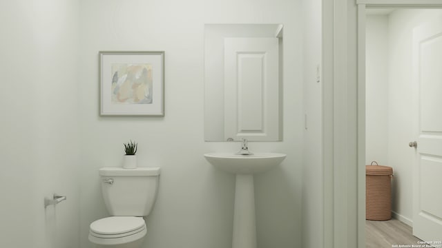 5658 Azure Aly, San Antonio, TX 78223 - half bath featuring toilet and wood finished floors