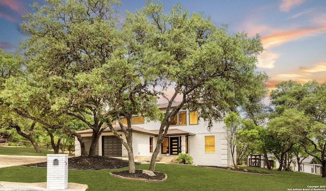 29302 Grand Coteau, Boerne, TX 78015 - view of front of property with a lawn, an attached garage, and driveway