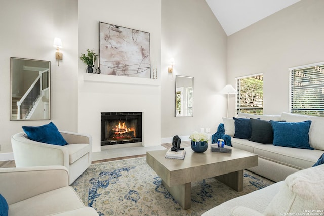 29302 Grand Coteau, Boerne, TX 78015 - living room featuring high vaulted ceiling, a fireplace with flush hearth, and baseboards