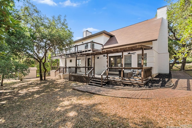 29302 Grand Coteau, Boerne, TX 78015 - back of property featuring a chimney, a ceiling fan, a deck, and a balcony