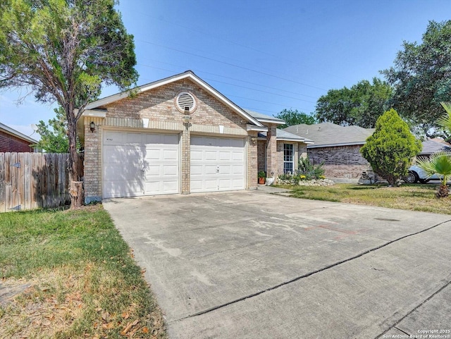 7142 Coral Spgs, San Antonio, TX 78250 - view of front of house with brick siding, concrete driveway, and a garage
