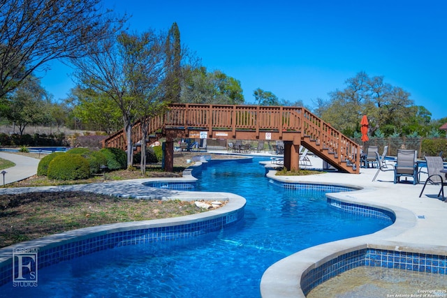 562 Orchard Way, New Braunfels, TX 78132 - swimming pool featuring stairway and a patio area