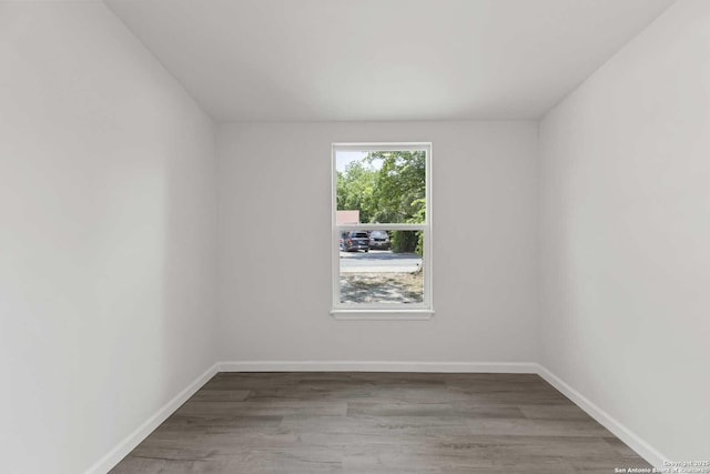 1711 Hermine, San Antonio, TX 78201 - spare room with wood finished floors and baseboards