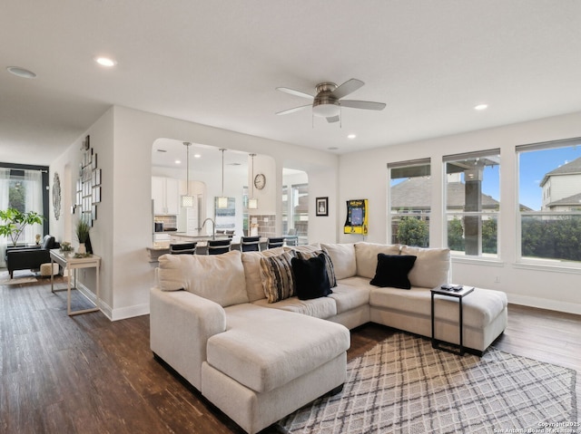 20310 Roche Oak, San Antonio, TX 78259 - living room with arched walkways, plenty of natural light, dark wood finished floors, a ceiling fan, and recessed lighting
