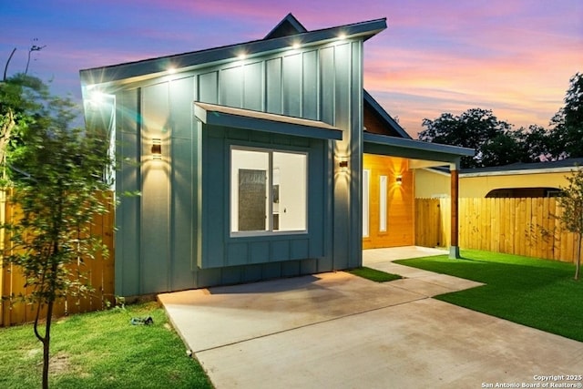 1422 Sherman, San Antonio, TX 78202 - view of front of property featuring board and batten siding and a patio area