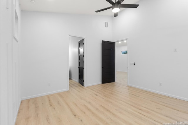 1422 Sherman, San Antonio, TX 78202 - spare room with a ceiling fan, wood finished floors, baseboards, and high vaulted ceiling