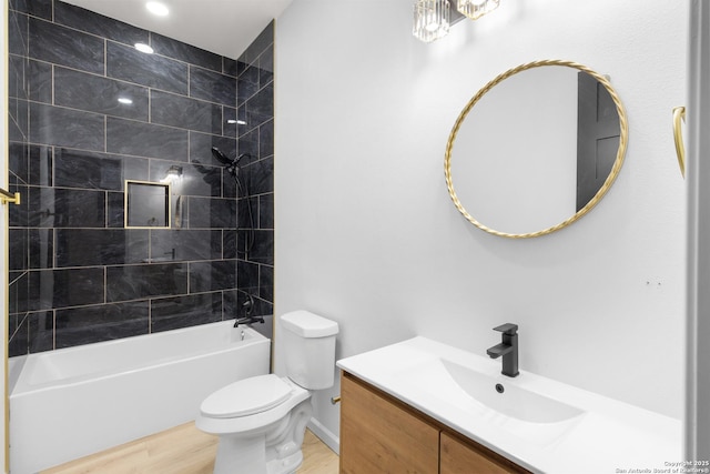 1422 Sherman, San Antonio, TX 78202 - bathroom with toilet, vanity, tub / shower combination, and wood finished floors