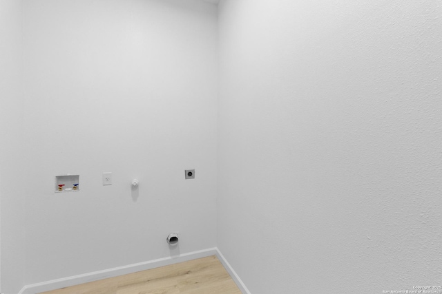 1422 Sherman, San Antonio, TX 78202 - laundry room featuring hookup for an electric dryer, baseboards, light wood-type flooring, hookup for a washing machine, and gas dryer hookup