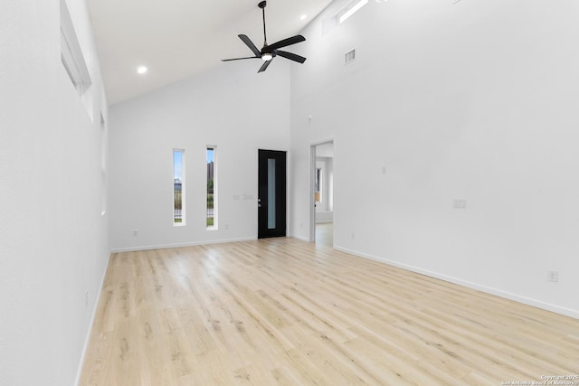 1422 Sherman, San Antonio, TX 78202 - unfurnished living room featuring a ceiling fan, light wood-style flooring, high vaulted ceiling, baseboards, and recessed lighting