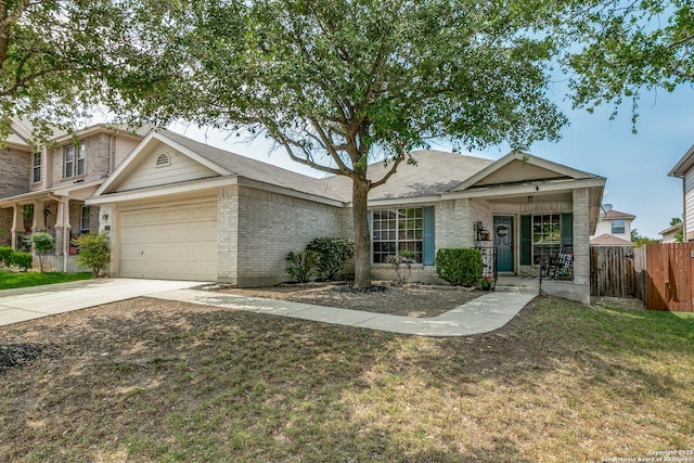 12707 Avens Arbor, San Antonio, TX 78253 - view of front of house with brick siding, an attached garage, concrete driveway, and covered porch