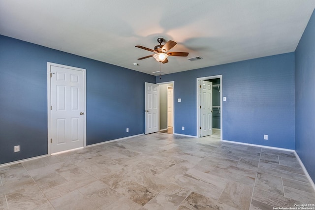 12707 Avens Arbor, San Antonio, TX 78253 - unfurnished bedroom featuring baseboards and a ceiling fan