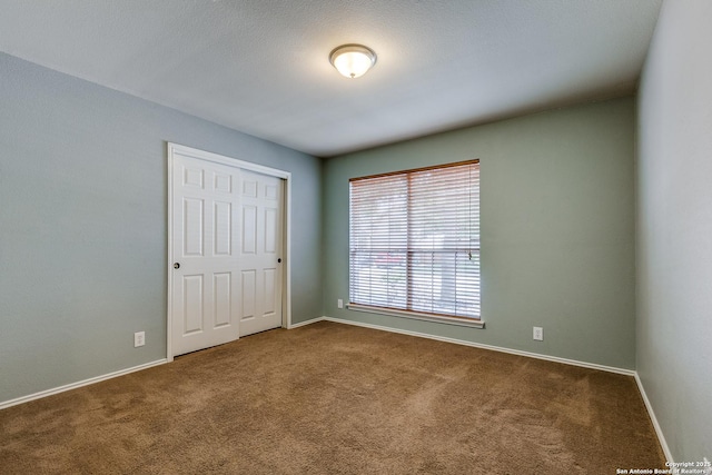 12707 Avens Arbor, San Antonio, TX 78253 - unfurnished bedroom with carpet floors, baseboards, and a closet