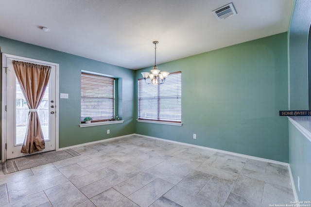 12707 Avens Arbor, San Antonio, TX 78253 - unfurnished dining area with a chandelier, healthy amount of natural light, and baseboards
