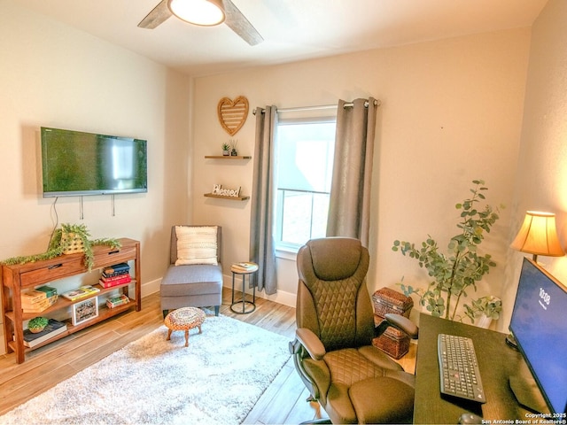 113 Bayberry Ct, La Vernia, TX 78121 - living area with wood finished floors and ceiling fan