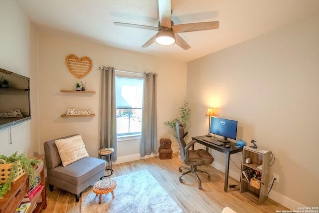 113 Bayberry Ct, La Vernia, TX 78121 - home office featuring wood finished floors, a ceiling fan, and baseboards