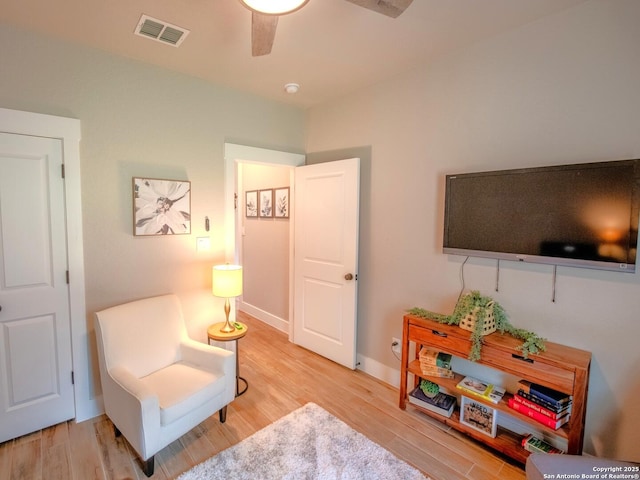 113 Bayberry Ct, La Vernia, TX 78121 - sitting room with wood finished floors, a ceiling fan, and baseboards