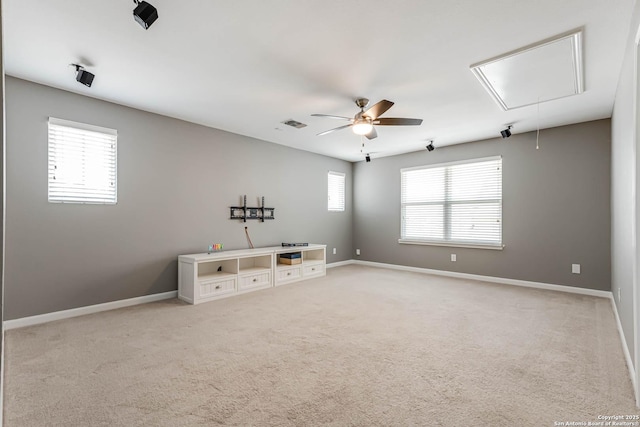 3319 Brooktree Ct, San Antonio, TX 78261 - spare room with attic access, ceiling fan, light carpet, and baseboards