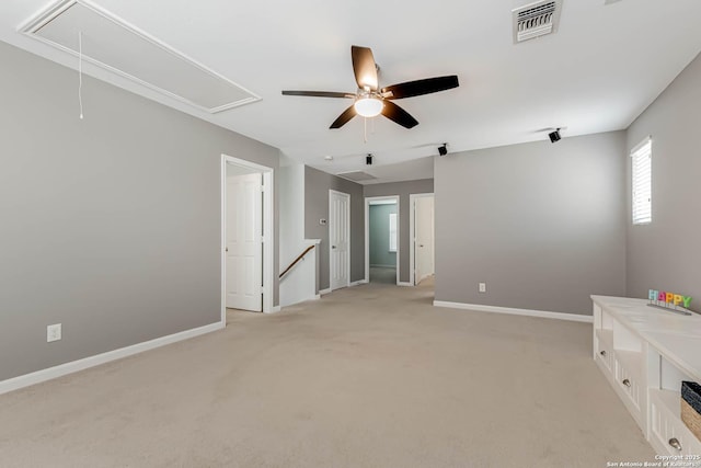 3319 Brooktree Ct, San Antonio, TX 78261 - spare room featuring attic access, light colored carpet, a ceiling fan, and baseboards