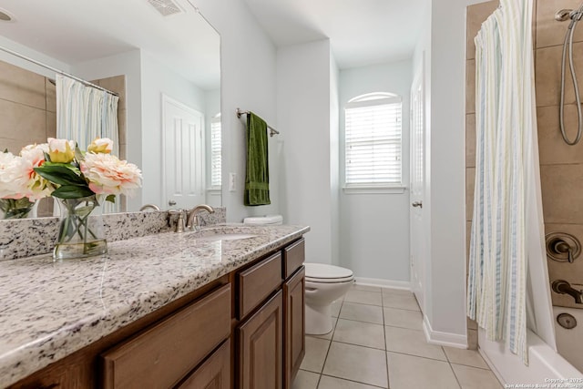 3319 Brooktree Ct, San Antonio, TX 78261 - full bath with toilet, tile patterned flooring, vanity, shower / bath combo with shower curtain, and baseboards