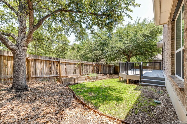 3319 Brooktree Ct, San Antonio, TX 78261 - view of yard with a wooden deck