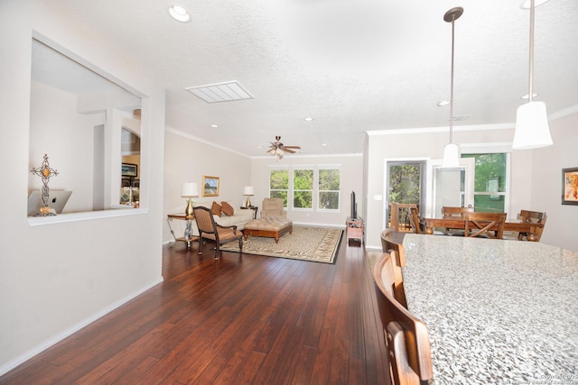 10772 Texas Star, Helotes, TX 78023 - dining space with dark wood-style floors, ornamental molding, recessed lighting, baseboards, and ceiling fan