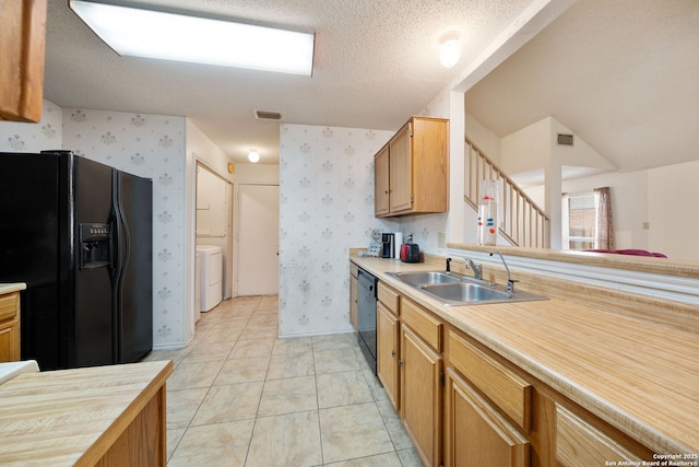 11334 Bald Mountain Dr, San Antonio, TX 78245 - kitchen featuring black appliances, a sink, wallpapered walls, light countertops, and baseboards
