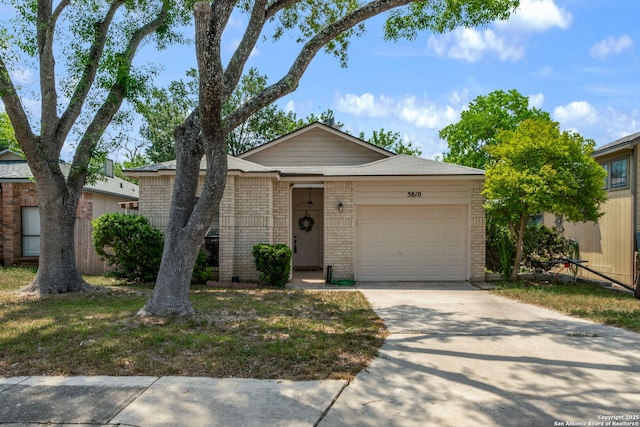 5810 Spring Grn, San Antonio, TX 78247 - ranch-style house featuring a garage, brick siding, and concrete driveway