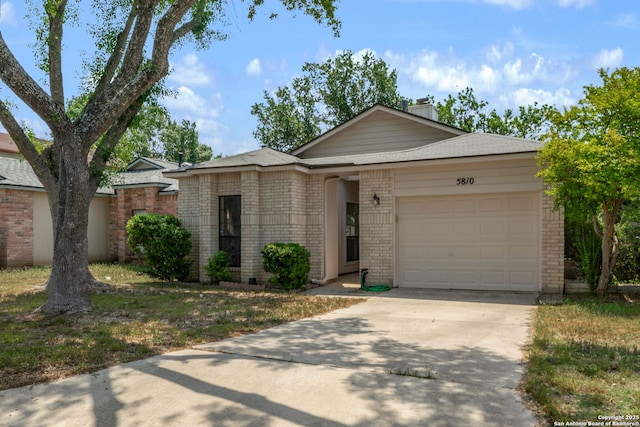 5810 Spring Grn, San Antonio, TX 78247 - ranch-style house featuring brick siding, concrete driveway, an attached garage, and a chimney