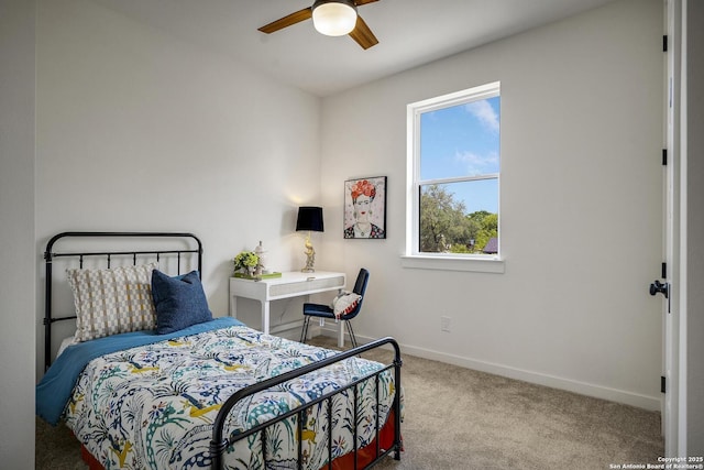 1947 W French Pl, San Antonio, TX 78201 - bedroom with carpet floors, baseboards, and a ceiling fan