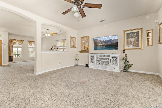 8607 Lahemaa, San Antonio, TX 78251 - unfurnished living room featuring a ceiling fan, carpet, and baseboards