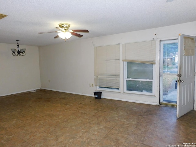 10223 Flatland Trl, Converse, TX 78109 - unfurnished room featuring ceiling fan, a chandelier, a textured ceiling, and baseboards