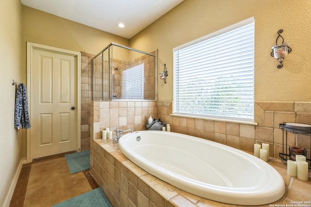 448 Western, Bandera, TX 78003 - bathroom featuring a bath and a stall shower