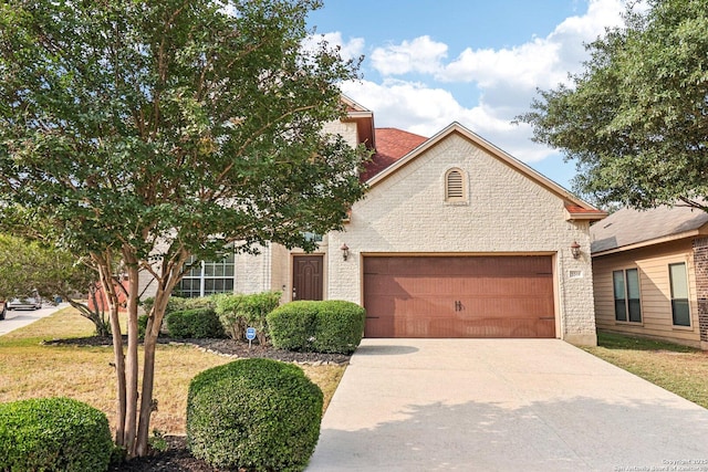 5514 Waldon Walk, San Antonio, TX 78261 - view of front of property with an attached garage, concrete driveway, and a front yard