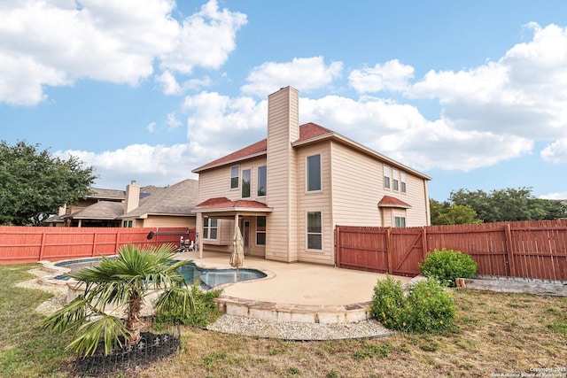 5514 Waldon Walk, San Antonio, TX 78261 - back of house with a patio area, a fenced backyard, and a chimney