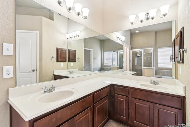 5514 Waldon Walk, San Antonio, TX 78261 - bathroom with a shower stall, double vanity, and plenty of natural light