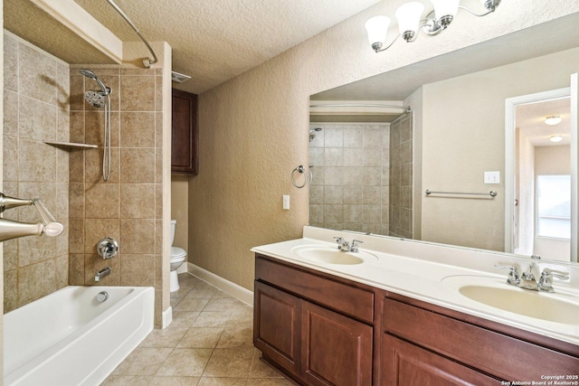 5514 Waldon Walk, San Antonio, TX 78261 - bathroom featuring a textured wall, a textured ceiling, toilet, double vanity, and shower / washtub combination