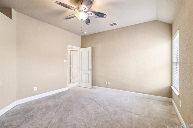 5514 Waldon Walk, San Antonio, TX 78261 - carpeted spare room with ceiling fan, a textured ceiling, lofted ceiling, and baseboards