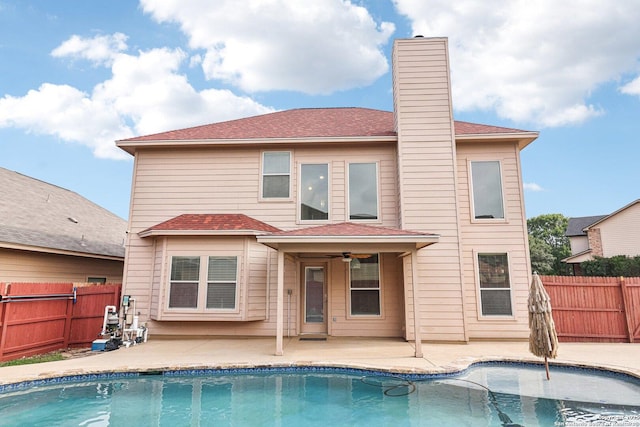 5514 Waldon Walk, San Antonio, TX 78261 - back of house featuring a patio, a fenced backyard, and a chimney