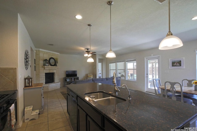 12106 Calm Hbr, San Antonio, TX 78253 - kitchen with a sink, a ceiling fan, light tile patterned floors, decorative light fixtures, and recessed lighting