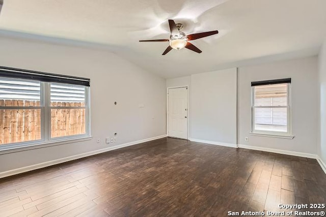 6862 Maple Spgs Unit 6862, San Antonio, TX 78249 - spare room featuring ceiling fan, dark wood-style floors, lofted ceiling, and baseboards