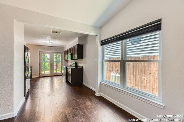 6862 Maple Spgs Unit 6862, San Antonio, TX 78249 - kitchen featuring appliances with stainless steel finishes, french doors, dark wood finished floors, and baseboards