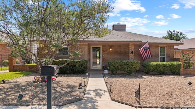 1008 Robert Derrick Dr, Schertz, TX 78154 - ranch-style house featuring brick siding, a chimney, and a shingled roof