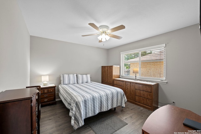 1008 Robert Derrick Dr, Schertz, TX 78154 - bedroom with dark wood-style flooring and ceiling fan